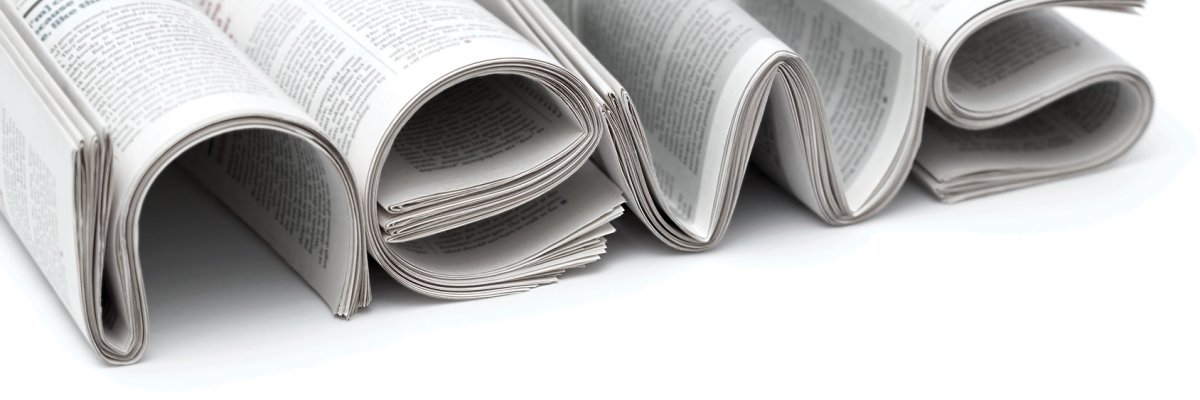 Zeitungen bilden das Wort "News" Zeitungen bilden das Wort "News"
